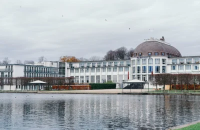 Scenic view of Parkhotel near a tranquil lake in Bremen, Germany.