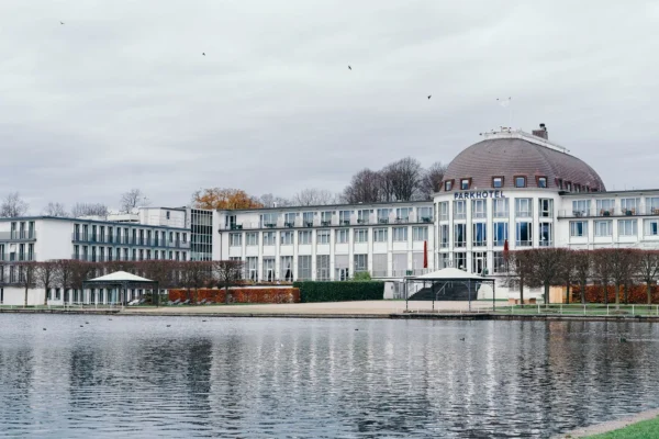 Scenic view of Parkhotel near a tranquil lake in Bremen, Germany.